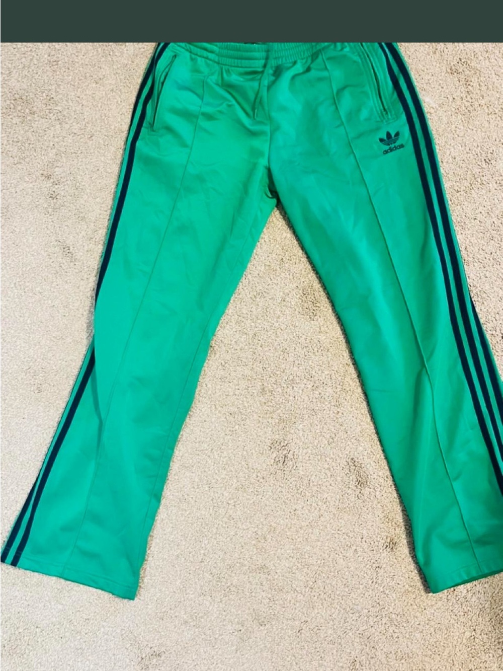 adidasTeal Green Track Pants with black Side Stripes